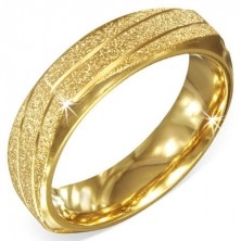 Arany színű szögletes acél gyűrű, szemcsés ferde bevágásokkal