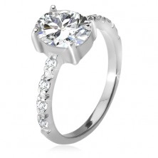 925 ezüst gyűrű, cirkóniás szárak, ovális átlátszó kő