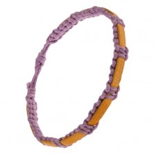 Fonott lila színű karkötő zsinórokból, mustár színű bőrsáv a felszínen