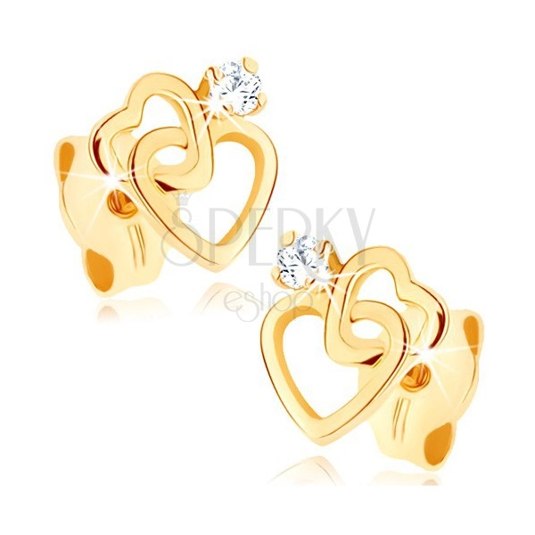 Fülbevaló 9K sárga aranyból - két vékony szív alakú kontúr, átlátszó cirkónia