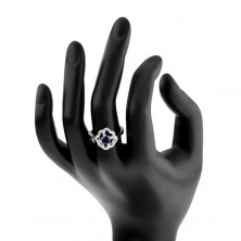 Ródiumozott gyűrű 925 ezüstből, átlátszó négylevelű körvonal kék cirkóniával