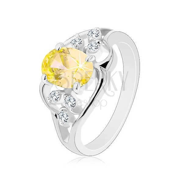 Ezüst színű gyűrű, nagy sárga ovális cirkónia, aszimmetrikus vonalak