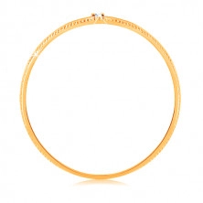 Gyűrű 14K sárga aranyból - apró, átlátszó cirkónia, finom bordázott szárak