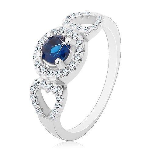 925 ezüst gyűrű, kerek kék cirkónia, csillogó szív körvonal a szélein - Nagyság: 65