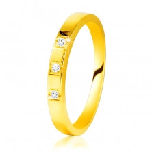 585  sárga arany gyűrű - fényes vállak, három fényes cirkóniával